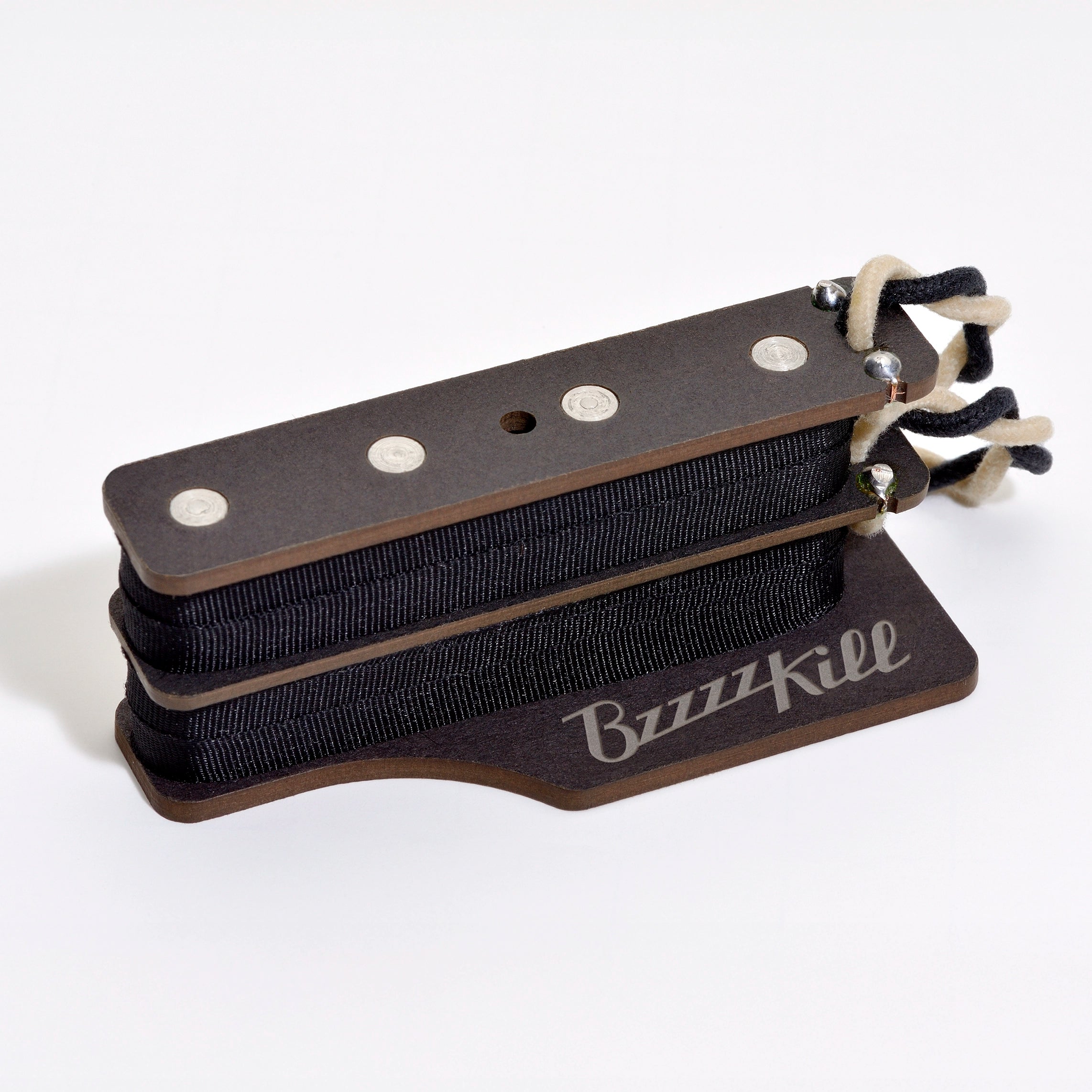 The BzzzzKill Dual Layer device for eliminating Fender Stratocaster 60 cycle hum in all pickup selector positions. On white background.