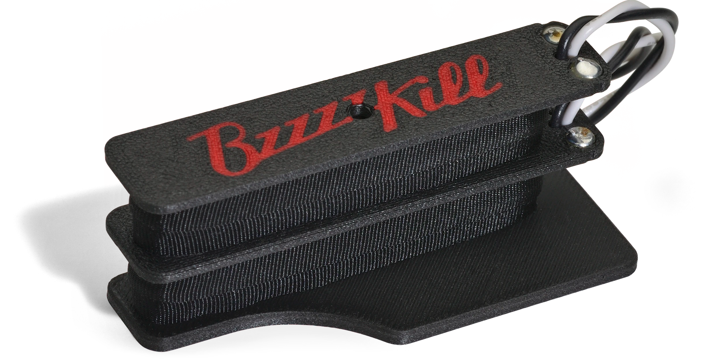 The BzzzzKill Dual Layer Players Series device for eliminating Fender Stratocaster 60 cycle hum in all pickup selector positions.
