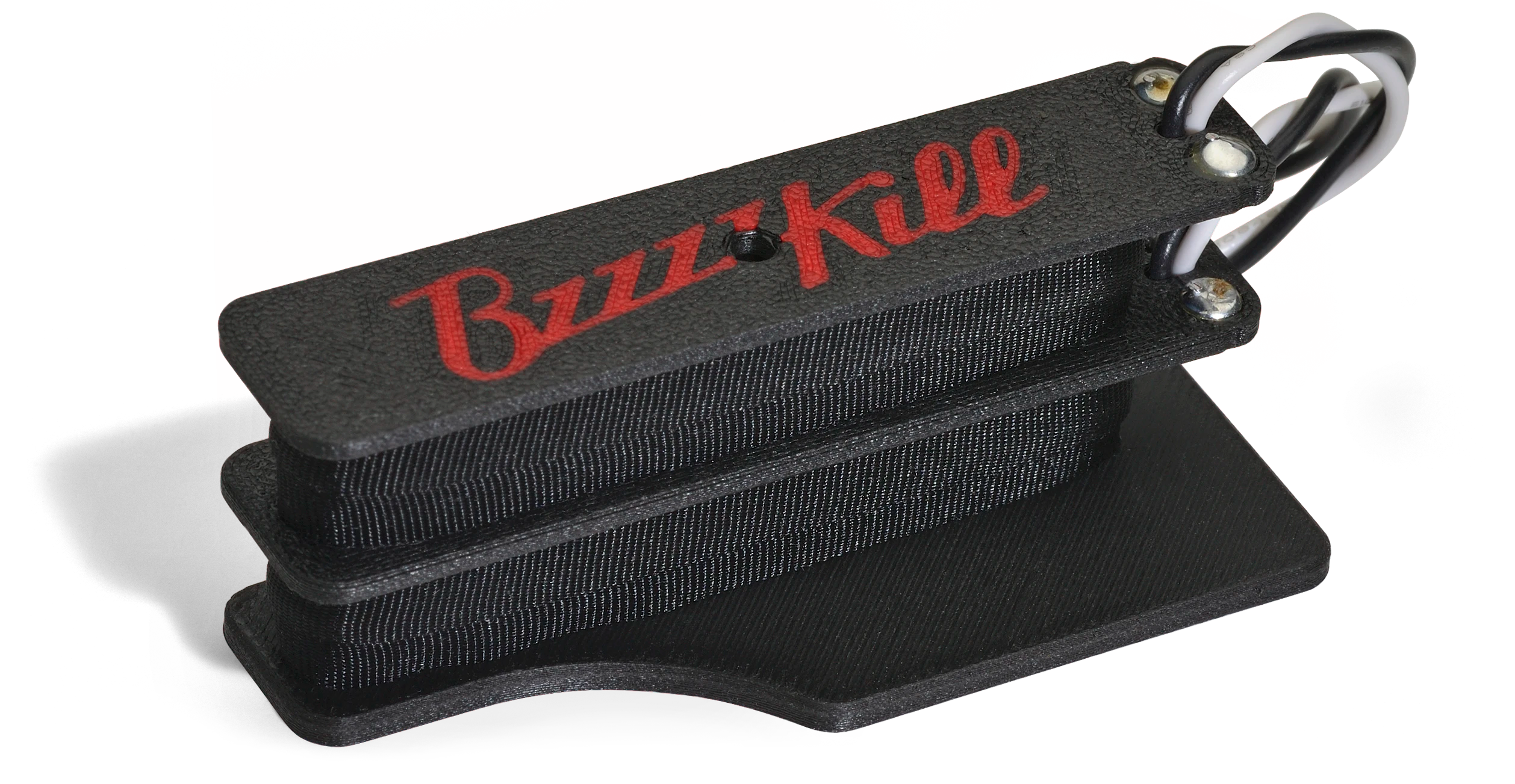 The BzzzzKill Dual Layer Players Series device for eliminating Fender Stratocaster 60 cycle hum in all pickup selector positions.