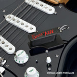 The BzzzzKill Single Layer Players Series device, sitting on a black Stratocaster with text reading: Installs under pickguard.