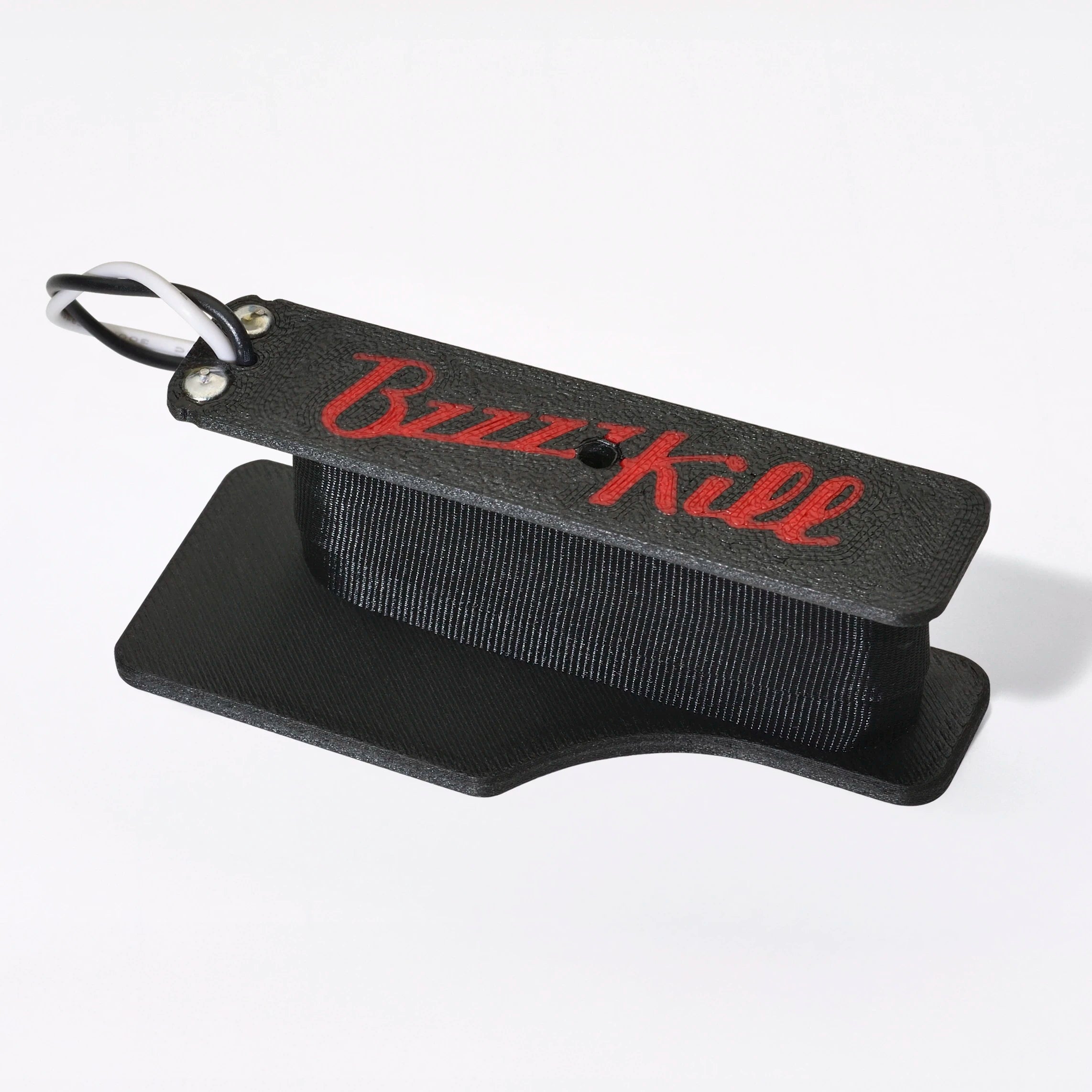 The BzzzzKill Single Layer Players Series device for eliminating Fender Stratocaster 60 cycle hum in all pickup selector positions. On white background. For left handed guitars.