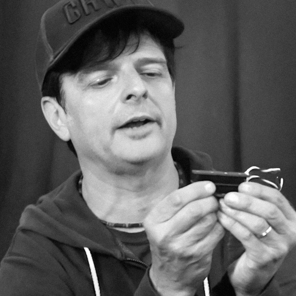 Paul Riario holding BzzzzKill.